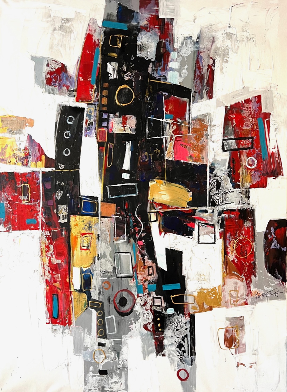 Paul Ygartua in his studio beneath a large portrait painting